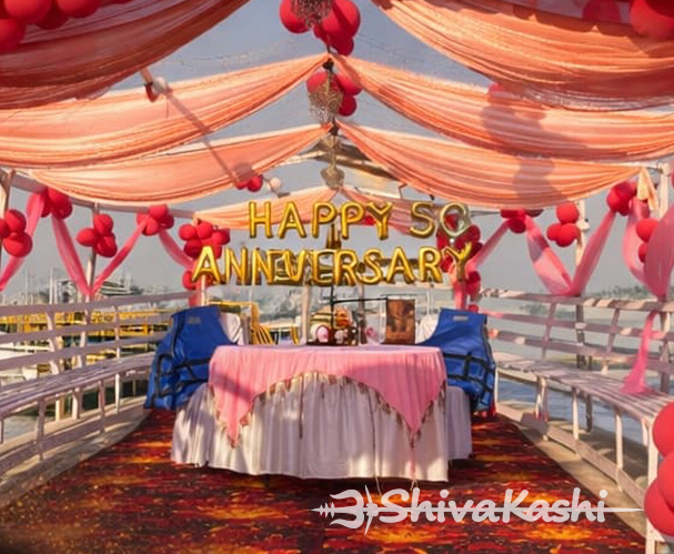 Romantic anniversary boat setup candles Varanasi